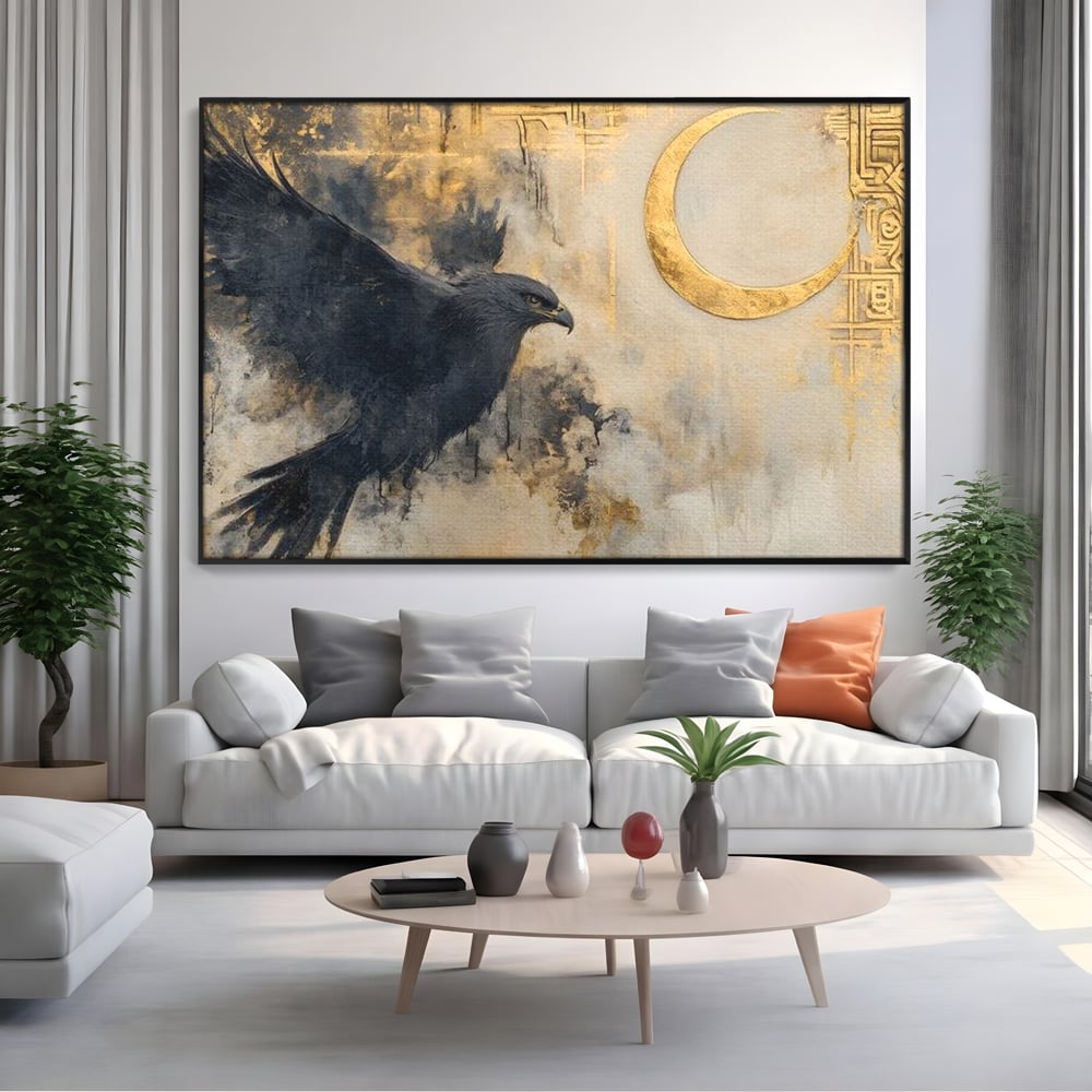 Tablou canvas cu tablou canvas cu vultur si semiluna aurie, in rama de aluminiu negru, pe perete intr-un living